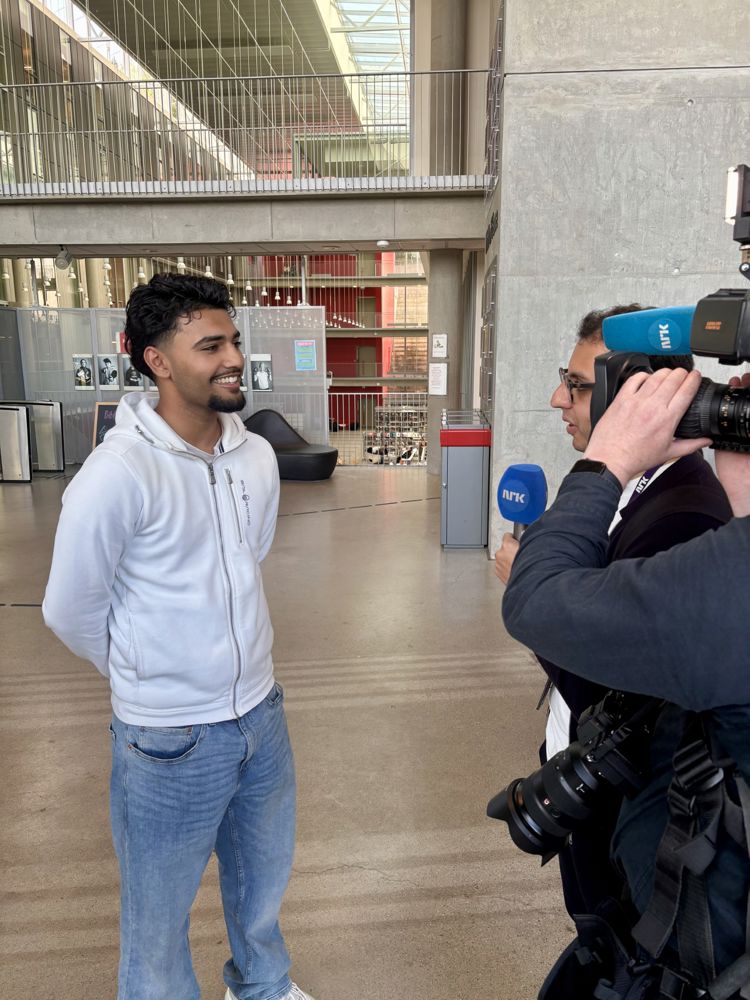 en person med et kamera og en person med et kamera